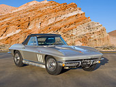 VET 03 RK0731 01
1966 Chevrolet Corvette L72 427/425HP Roadster Gray 3/4 Front View On Pavement By Red Rock