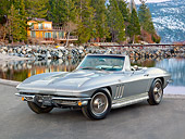 VET 03 RK0732 01
1966 Chevrolet Corvette L72 427/425HP Roadster Gray 3/4 Front View On Pavement By Lake And Cabin
