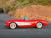 VET 03 RK0741 01
1960 Chevrolet Corvette Red With White Cove Profile View On Road In Hills
