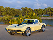 VET 03 RK0767 01
1967 Chevrolet Corvette Yellow 3/4 Side View On Pavement By Pond And Trees