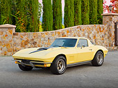 VET 03 RK0770 01
1967 Chevrolet Corvette Yellow 3/4 Front View On Pavement By Stone Wall And Trees