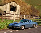 VET 03 RK0019 03
1964 Chevrolet Corvette 327 Silver 3/4 Side On Road