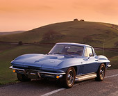 VET 03 RK0020 08
1966 Chevrolet Corvette 427 Blue 3/4 Front View On Road By Hills At Dusk