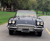VET 03 RK0045 01
1961 Chevrolet Corvette Convertible Black Head On Shot On Pavement Trees Background