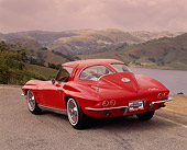 VET 03 RK0066 03
1963 Chevrolet Corvette Split Window 327 Red 3/4 Rear View On Pavement By Hills