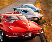 VET 03 RK0076 03
1963-1967 Chevrolet Corvettes Parked On Hill On Road 3/4 Rear View