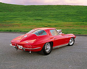 VET 03 RK0266 02
1963 Chevrolet Corvette Fuel Injected Split Window Red 3/4 Rear View On Pavement By Hills