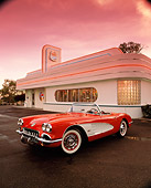 VET 03 RK0287 07
1960 Corvette Convertible Red And White 3/4 Front View On Pavement By Diner Red Sky