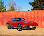 VET 03 RK0320 07
1965 Chevrolet Corvette Coupe Fuel Injected Red 3/4 Front View On Dirt