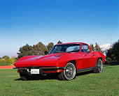 VET 03 RK0322 05
1965 Chevrolet Corvette Coupe Fuel Injected Red Low 3/4 Front View On Grass