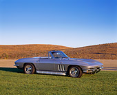 VET 03 RK0328 02
1965 Chevrolet Corvette 396 Convertible Silver 3/4 Front View On Grass