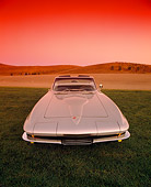 VET 03 RK0331 05
1965 Chevrolet Corvette 396 Convertible Silver Wide Angle Head On Shot On Grass Red Filter