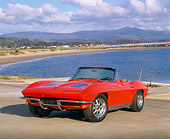 VET 03 RK0357 05
1963 Chevrolet Corvette 327 Convertible Red 3/4 Front View On Pavement By Water