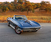 VET 03 RK0366 03
1967 Chevrolet Corvette Stingray Convertible Blue 3/4 Front View On Pavement By Trees