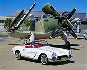 VET 03 RK0412 04
1962 Chevrolet Corvette Convertible White 3/4 Front View On Pavement By Military Airplane