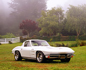 VET 03 RK0456 02
1963 Chevrolet Corvette Split Window White 3/4 Side View On Grass By Trees Fog