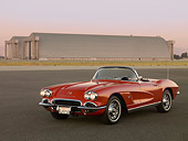 VET 03 RK0497 01
1962 Chevrolet Corvette Roadster Red 3/4 Front View On Pavement At Dusk