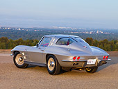 VET 03 RK0518 01
1963 Chevrolet Corvette Sting Ray Sport Coupe Silver Low 3/4 Rear View On Pavement