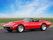 VET 03 RK0541 01
1969 Chevrolet Corvette Stingray Convertible Red 3/4 Front View On Pavement By Field And Sky