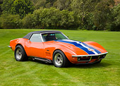 VET 03 RK0557 01
1969 Chevrolet Corvette ZL1 Roadster Orange With Blue And White Stripe 3/4 Front View On Lawn