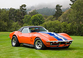 VET 03 RK0558 01
1969 Chevrolet Corvette ZL1 Roadster Orange With Blue And White Stripe 3/4 Front View On Lawn