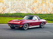 VET 03 RK0585 01
1967 Chevrolet Corvette Convertible Maroon 3/4 Front View On Pavement By Building And Shrubs
