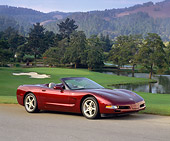 VET 04 RK0026 04
2003 Chevrolet Corvette 50th Anniversary Edition Burgundy 3/4 Front View On Pavement By Golf Course And Lake