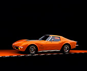 VET 05 RK0139 06
1971 Chevrolet Corvette Stingray Orange Bullstripe Side 3/4 View On Checkered Line Studio