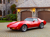 VET 05 RK0213 01
1977 Chevrolet Corvette Red 3/4 Front View On Brick By House