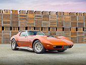 VET 05 RK0216 01
1974 Chevrolet Corvette Sunburst Yellow 3/4 Front View On Gravel By Wooden Crates