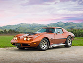 VET 05 RK0223 01
1974 Chevrolet Corvette Sunburst Yellow 3/4 Front View On Gravel By Grass Field And Hills