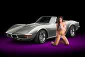 VET 05 RK0237 01
1972 Chevrolet Corvette LT-1 Steel Cities Gray 3/4 Front View In Studio With Swimsuit Model
