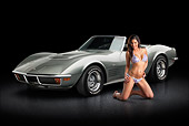 VET 05 RK0238 01
1972 Chevrolet Corvette LT-1 Steel Cities Gray 3/4 Front View On Pavement With Swimsuit Model