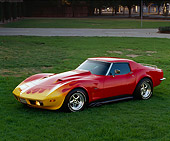 VET 05 RK0004 01
1973 Chevy Corvette Red With Yellow Flames 3/4 Side View On Grass