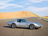 VET 05 RK0163 01
1973 Chevrolet Corvette Coupe Silver 3/4 Front View By Hill