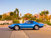 VET 05 RK0188 01
1971 Chevrolet Corvette Stingray Blue Profile View On Pavement By Building And Palm Trees