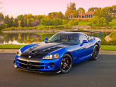 VIP 01 RK0327 01
2010 Dodge Viper ACR Blue With Black Stripe 3/4 Front View On Pavement By Pond And Trees