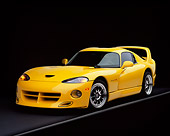 VIP 01 RK0126 04
1996 Hennessey Viper Venom 650R Yellow 3/4 Front View On Gray Line Headlights On Studio