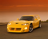 VIP 01 RK0131 01
1996 Dodge Hennessey Viper Venom 650R Yellow 3/4 View On Pavement By Water At Dusk