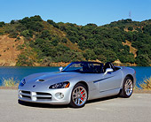 VIP 01 RK0203 01
2005 Dodge Viper Convertible Silver 3/4 Front View On Pavement By Lake And Hills