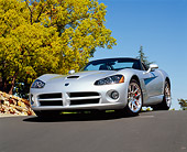 VIP 01 RK0207 04
2005 Dodge Viper Convertible Silver Low 3/4 Front View On Pavement Bridge By Trees