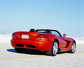 VIP 01 RK0222 04
2005 Dodge Viper SRT/10 Convertible Copper Head Orange 3/4 Rear View On Pavement