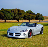 VIP 01 RK0230 01
2005 Dodge Hennessey Viper Convertible Silver 3/4 Front View On Grass By Trees