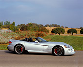 VIP 01 RK0232 01
2005 Dodge Hennessey Viper Convertible Silver 3/4 Front View On Pavement By Bushes