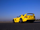 VIP 01 RK0256 01
2006 Hennessey Venom 800R Yellow Low 3/4 Rear View On Pavement