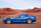 VIP 02 BK0003 01
2013 SRT Viper GTS Blue With White Stripes Profile View On Dirt In Desert