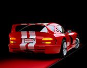 VIP 02 RK0061 05
1997 Dodge Hennessey Viper Venom 600 GTS Red White Stripes 3/4 Rear View On Red Floor Studio