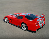 VIP 02 RK0143 03
Dodge Viper GTSR Concept Car Red Silver Stripe Overhead 3/4 View On Pavement