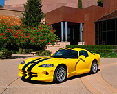 VIP 02 RK0162 03
2001 Viper GTS ACR Yellow Black Stripe 3/4 Front View On Pavement By Trees And Building