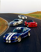 VIP 03 RK0039 05
Four Dodge Vipers Parked On Race Track Parking Lights On At Dusk